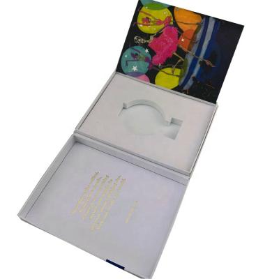 China Recycled Materials High End Scorched Bottle Book Shape Perfume Box With White Tray And Printed Leaflet for sale