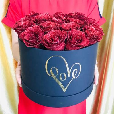 China Recycled Materials Custom Logo Printing Valentine's Day Gift Boxes Love Phrase Rose Wrapping In Round Shape for sale