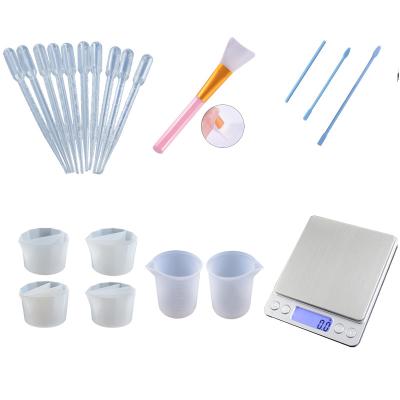 China DIY 30ml/100ml/250ml Silicone Mold Measuring Cup Silicone Stick Viable Silicone Tool for sale