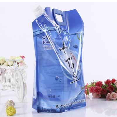 China Disposable Customize Water Packaging Plastic Stand Up Liquid Spout Pouch Pouch With Handle for sale