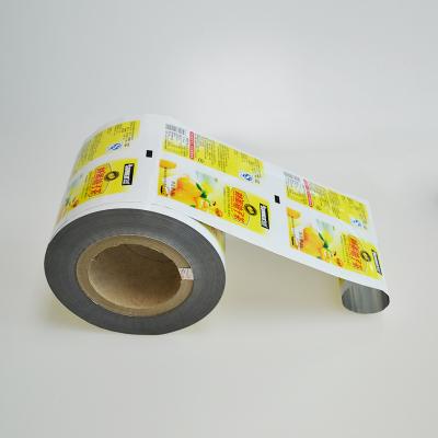 China Custom Auto Wrapping Film Roll Moisture Proof Plastic Laminated Foil for Honey Tea Sauce Packing for sale