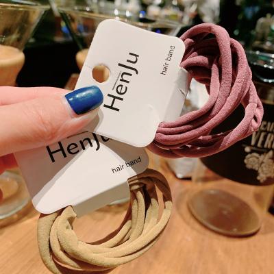 China Wholesale Scrunchies Famous Brands Designer Hair Accessories Kids Hair Tie Seamless Rope Hair Tie Band for sale