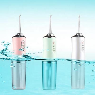 China IPX7 Waterproof Dental Flosser Toothbrush Ipx7 Portable Wireless Oral Water Irrigator Ultrasonic Tooth Cleaner for sale