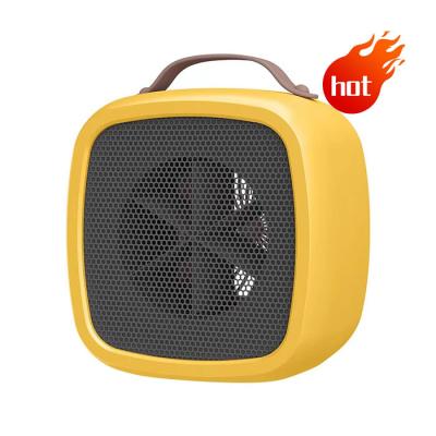 China 2022 New Design Desk Heater 500W PTC Air Warm Silent Personal Table Hot Desk Heating Fan Heater Fan Mini Electric Heater for sale