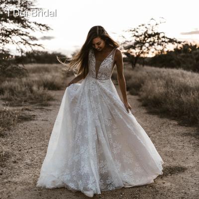 China Breathable Crystal Beaded Lace Bridal Gown Real Pearl Factory Photo Plunging Deep V Neck Wedding Dresses for sale