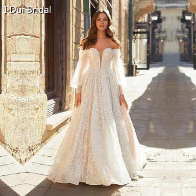 China Breathable With Luxury Beaded Lace Plunging Neckline New Wedding Dress Lantern Sleeve Off The Shoulder Wedding Dress for sale