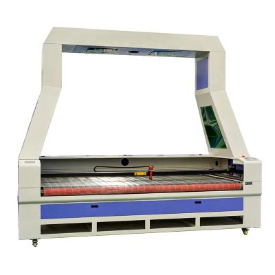 China Laser CUTTING Automatic Feeding CCD Laser CO2 Cutting Machine CO2 Laser Cutting Engraving Machine for sale