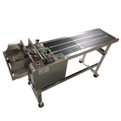 China Food Box Paper Plastic Bag Labeling Speed ​​Adjustable Automatic Conveyor Paging Machine for sale