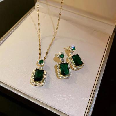 China Trendy Fashion Temperament Clavicle Chain Necklace Earrings Premium Quality Retro Rings Set Emerald Crystal Zircon Designs Jewelry Sets for sale