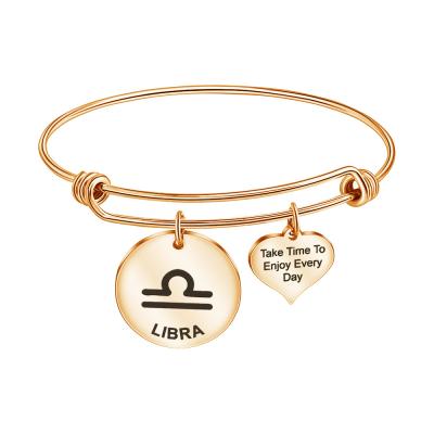 China Wholesale BOHEMIA Gold Plated Handmade Stainless Steel Astrology Bangle Bracelet With Round Heart Charm for sale