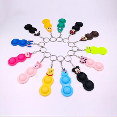 China Dangle Key Ring Silicone Stress Relief Keychain Mini Fidget Cartoon Simple Trigger Finger Bubble Keychains for sale