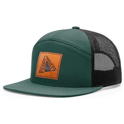 China Adults 61cm Plain Trucker Mesh Caps 7 Panel Laser Cut Hat for sale