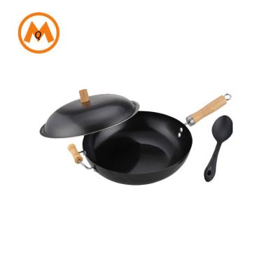 China Non Sustainable Stick Pressed Carbon Steel Wok With Wooden Handle for sale