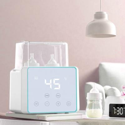 China BPA Free Steam Sterilizer Bottle Warmer with Multifunctional Smart Machine for Breastfeeding or Formula Milk for sale