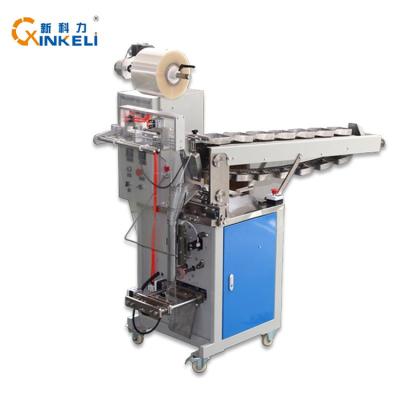 China Manual Feeding Pouch Dry Fruit Small Vertical Filling And Packing Machine for sale