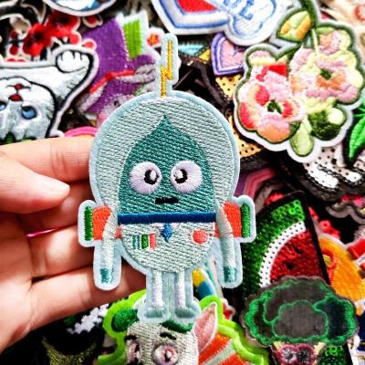 China Viable in cloth patch 30pcs/bag clothing accessories stock cartoon embroidered cloth shoes and hats paste back iron on patch for sale