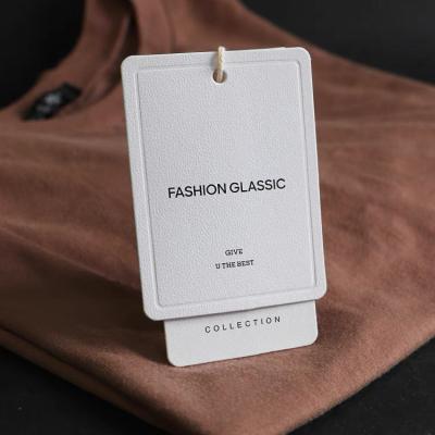 China Viable Wholesale Custom Luxury Texture Custom Clothing Jeans Garment Hang Tag Material Hang Tags for sale