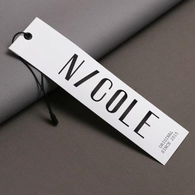 China Sustainable Luxury Clothing Swing Tags Printing Paper Hang Tags For Clothing for sale