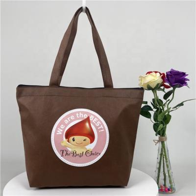 China Handled Nonwoven Bag Tote With Zipper Anime Crocodile Tote Bag Logo Black Tote Bag Diaper White Flower Tote for sale