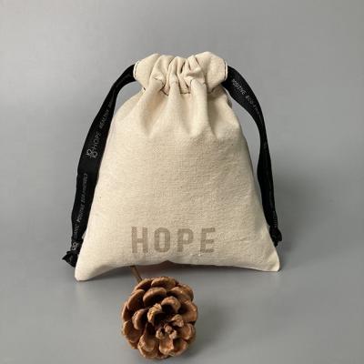 China Custom Reusable Rope Or Handle Cotton Makeup Bag With Logo Produce Shopping Bags Organic Cotton Drawstring Cosmetic Bag From Raw Cotton for sale