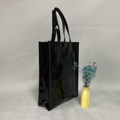 China Waterproof PVC Clear PVC Tote Bag Custom Logo Bag For Blanket With Handles Black PVC Plastic Packaging Bag for sale