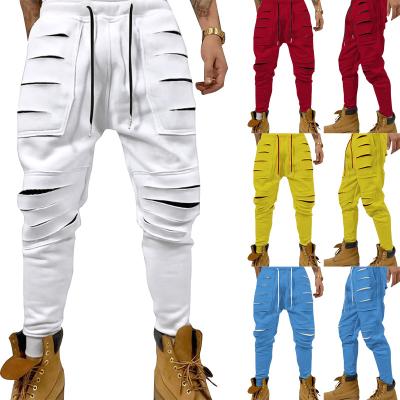 China 2021 Anti-wrinkle hollow out men's bottoms pants high street mid-waist pant hole hip hop men's trousers and pants male trousers for sale