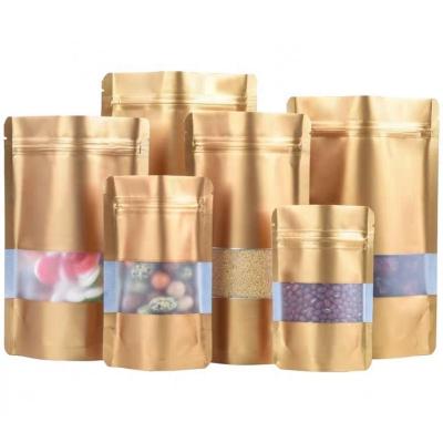 China Brown Food China Manufacturer Aluminum Foil Bag Kraft Paper Stand Up Pouch With Frosted Window for sale