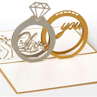 China Luxurious Recycled Materials 3D Pop Wedding Ring Card Pop Up Wedding Invitation Card With Envelope for sale