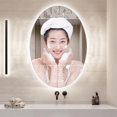 China Water Proof Drogging Moisture Proof Oval Touch Screen Vanity Mirror Smart Wall Mounted Backlit Led Lighted Bathroom Mirror for sale