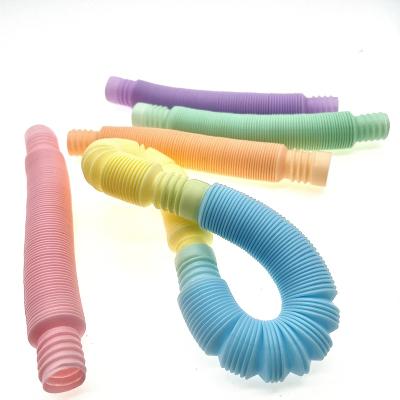 China Funny Amazon DIY Stretchy Person Colorful Plastic Tube Toys Sensory Tools Whistle Sensory Toys Noise Tubes Wiggle Toys Stretch Tube for sale