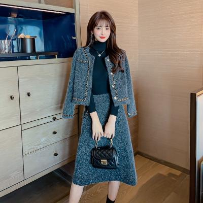 China Waterproof OULAIYADI Fashion Elegant Warmth Woolen Ladies Jacket Skirts Winter Two Piece Set Women Clothing for sale