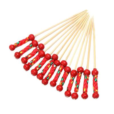 China Custom Colored Disposable Pearl Cocktail Pick Easily Cleaned Bamboo Skewer for sale