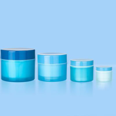 China Wholesale Empty Cosmetic Containers 60ML Plastic Cream Jar Blue Plastic Jars For Cosmetics for sale