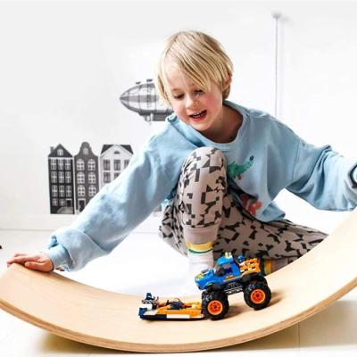 China Custom Natural Wood Multifunction Rocker Kids wooden Montessori Fitness Curvy Board for sale