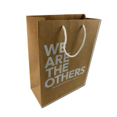 China Custom High Quality Recycled Materials Brown Kraft Paper Shopping Paper Bag With Rope Handles for sale