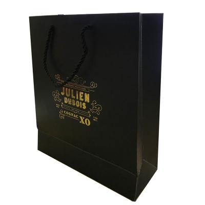 China Custom Personalized Printed Gold Foil LOGO Luxury Black Gift Bags Cardboard Recycled Shopping Paper Bags From Materials Manufacturer for sale