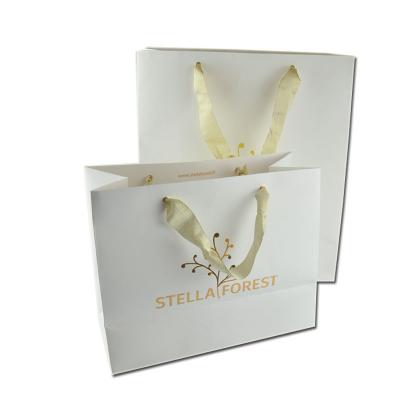 China Recycled Materials Custom Luxury Shopping Shoes Packaging Gold Hot Stamping Paper Bags With Ribbon Handles for sale