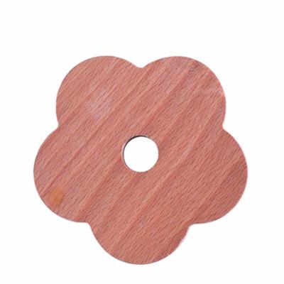 China Minimalist Natrually Flower Shaped Wooden Coaster With Hollow-carved Design Customized Design 10cm*1cm Thickness for sale