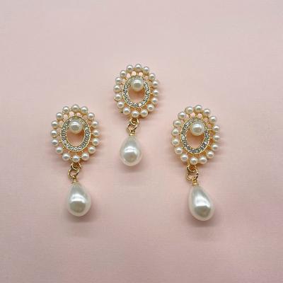 China Elegant Viable Pearl Rhinestone Button Bow Tie Embellishments Pendants For Jewelry Making for sale