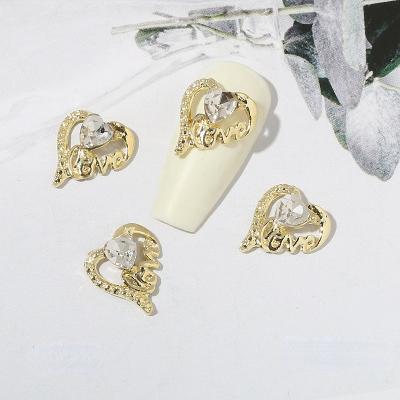 China Metal Gold Color Luxury Heart Bow 3D Alloy Pendant Butterfly Nail Art Charms Zircon Metal Manicure Nails DIY Decorations for sale