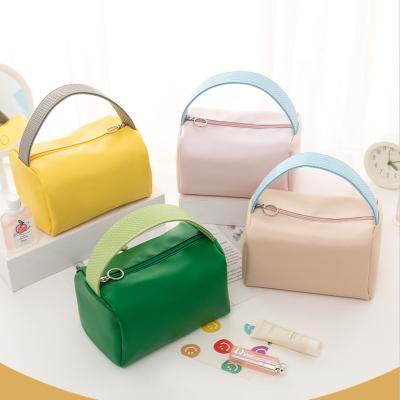 China New Makeup Bag Durable Portable Large Capacity Candy Color Portable Storage Wash Bag Customization for sale