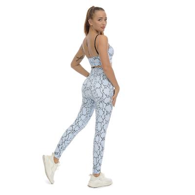 China Custom Logo Gym Sports Wear Women Breathable Equipment Blue Python Yoga Suit Sports Bra Gaiters Sets 2 Pieces for sale