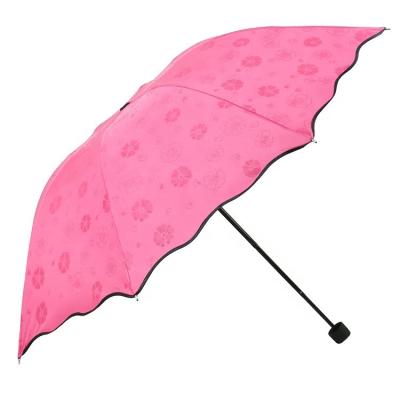 China UPF 50+ 2023 Popular Design Magical Flower Wavy Foldable Umbrellas For The Rain Waterproof For Woman for sale