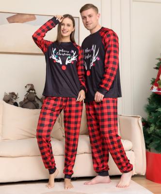 China Wholesale QUICK DRY 2023 Christmas pajamas family matching new year print long sleeve pants for women and men for sale