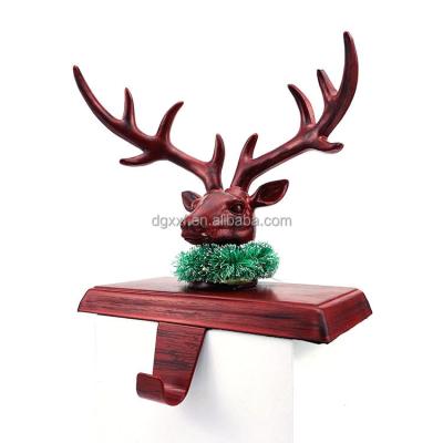 China Christamas Decoration Christmas Stocking Holder For Fireplace Mantel Stocking Holder Resin Deer Hook Holiday Main Decoration for sale