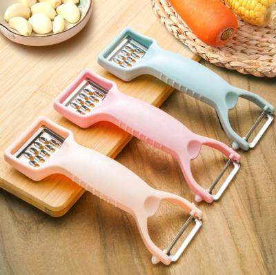 China Hot Stocked Home Gadgets Multi 2 In 1 Plastic Fruit Peeler With Stainless Steel Blade for sale