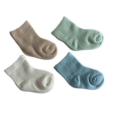 China Leisure ready to ship cute comfortable 100% cotton baby socks boys girls socks 100% cotton solid color baby socks for sale