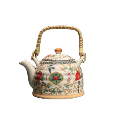 China Viable Hot Sale 600ml Chinese Style Teapot Wholesale Teapot Landscape Series Ceramic Drinkware Decal Printing Blue and White Teapot for sale