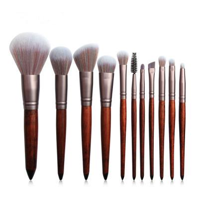 China Makes Applying Makeup DX11PCS Black Clean Brand Makeup Brush Luxury Makeup Bag Beauty Brush Set Makeup, Eye and Face Brush Tool for sale