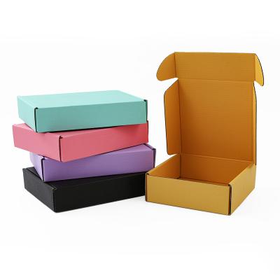 China Custom Recycled Materials Logo Small White Black Pink Kraft Corrugated Cardboard Shipping Box Clothing Kraft Paper Shipping Box for sale